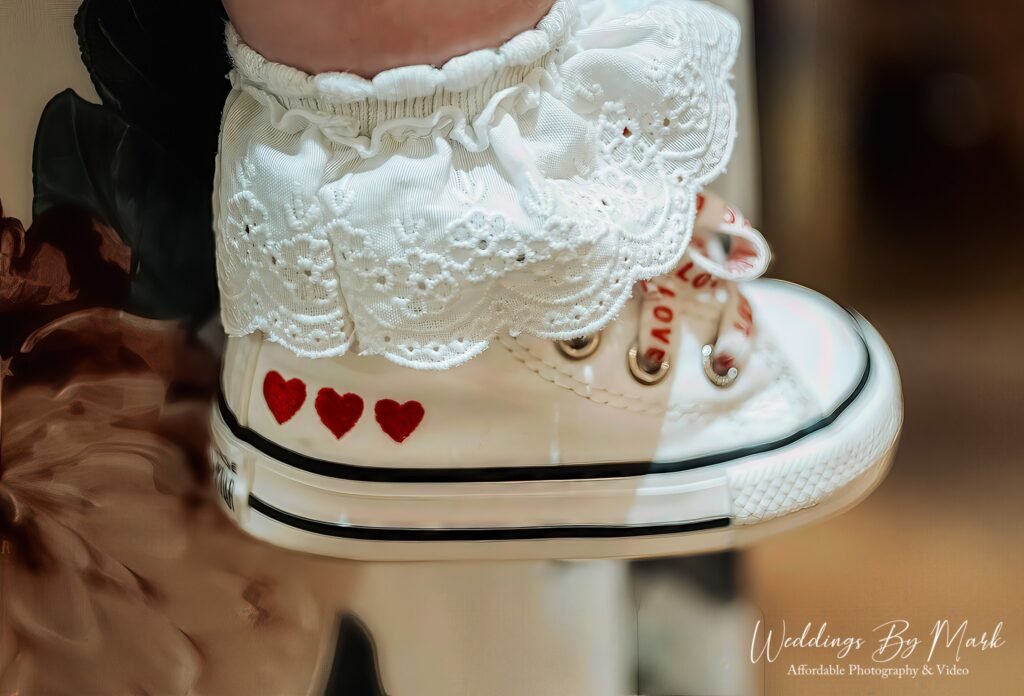 Candid wedding photography during a tipi reception at The Hidden Hive by Weddings by Mark.