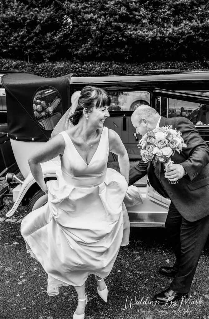 Wedding Photography moment 101..The Joy as the bride Steps out of the car and shouts im getting married!