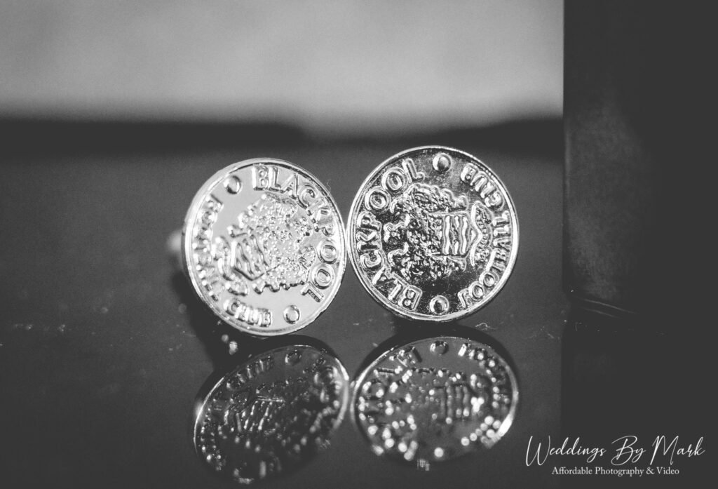 Close up of wedding rings and bridal bouquet at a Cheshire manor house wedding