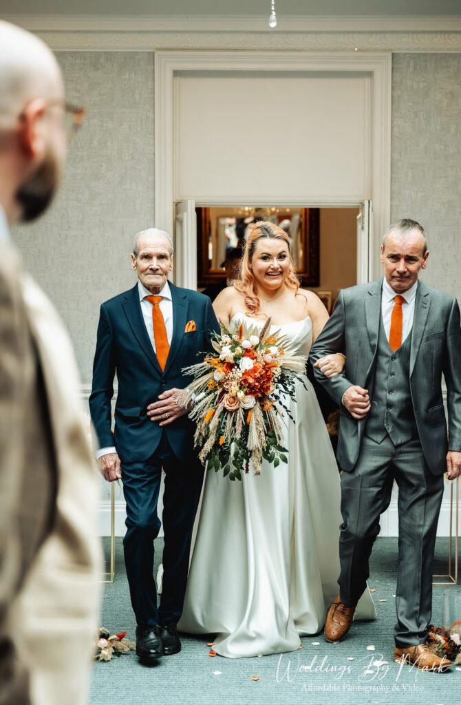 Wedding ceremony in the grand conservatory at Hollin House Hotel Bollington