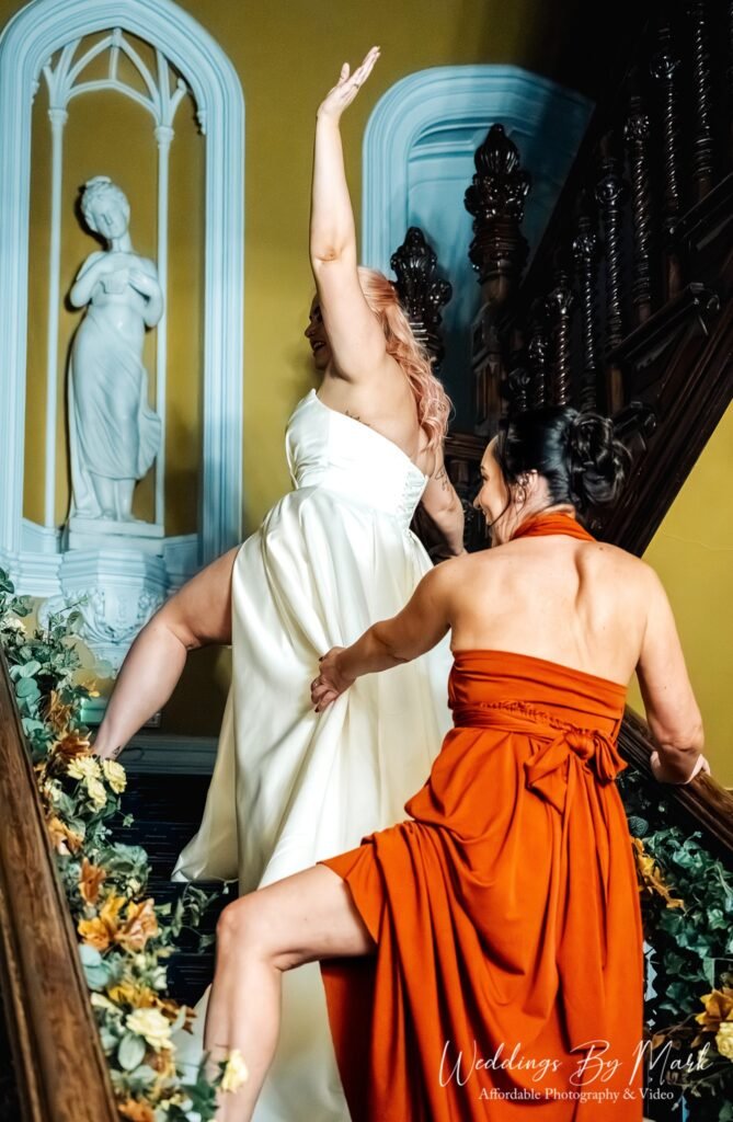 Candid wedding reception photography at Hollin House Hotel, capturing laughter and real emotions.