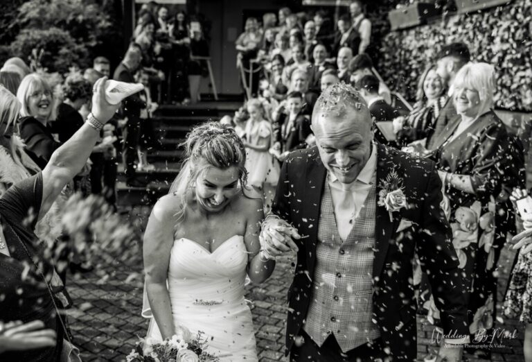 Confetti throw outside the main entrance of Grosvenor Pulford Hotel.