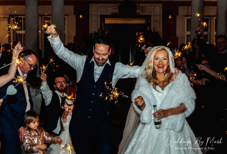 Magical winter wedding sparkler exit at Eaves Hall with Maria and Jonny