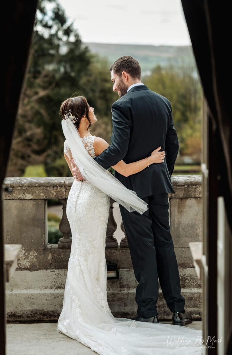Romantic Wedding Photography at eaves Hall on the Balcony